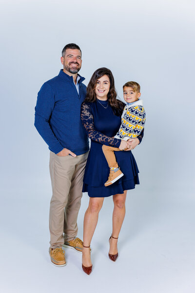 Mom and dad and boys formal shirts in studio photo