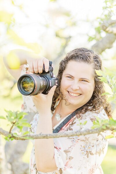 Sara Sniderman taking a photograph in Natick Massachusetts