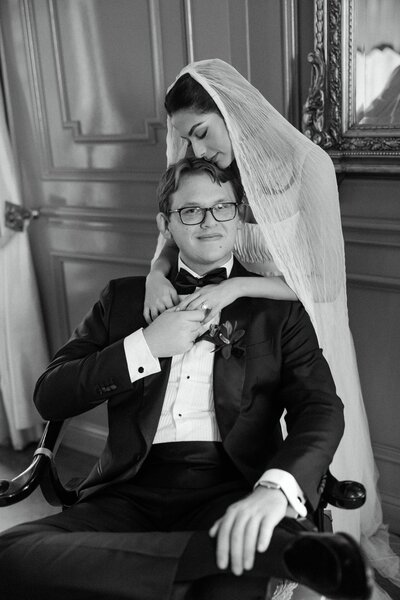 Black and white fine art bridal portrait captured in Fort Worth, Texas. A timeless and elegant wedding moment featuring a bride in a floral backdrop.