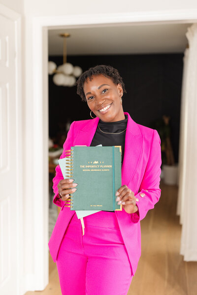 a woman hold her custom planners