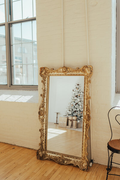 Gilded mirror at The Archer Atelier a Maine creative studio for photographers and artists