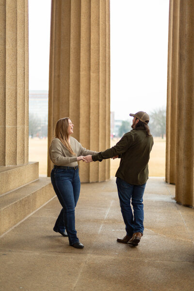 A romantic couple dancing at The Parthenon in Nashville, Tennessee.