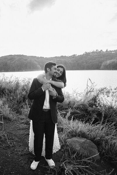 Woman hugs a man from behind