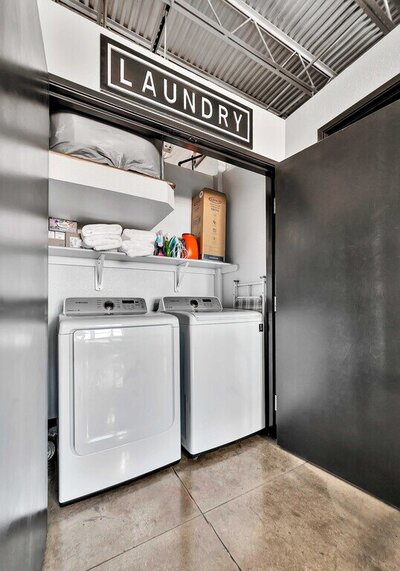 Washer and dryer included in this studio vacation rental condo in the historic Behrens building with a 5th floor view of downtown Waco, TX