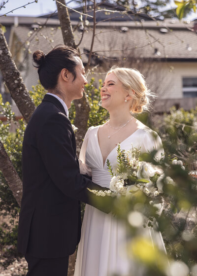 Couple during their first look in the garden at Mildred Hall in Portland Oregon.