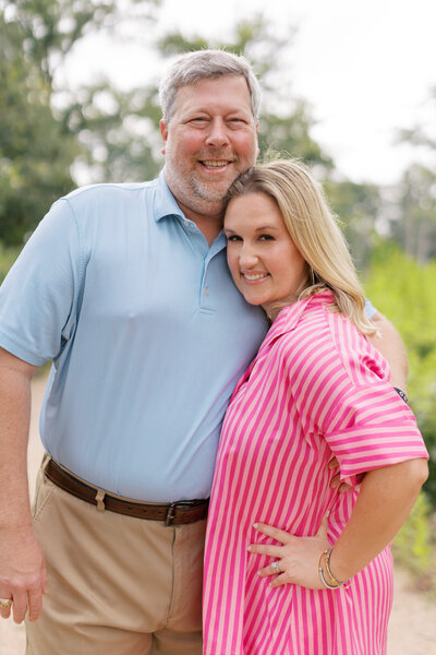 Paige and Chris McInturff smile at the camera