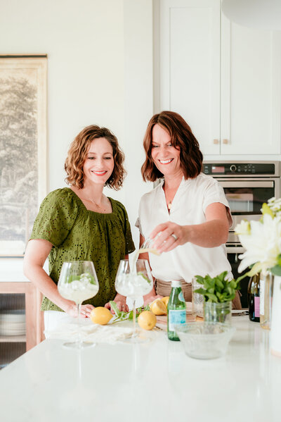Creative branding photo of a small business owner with props in a styled setting.