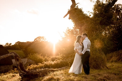 Bride and groom first look photos in field