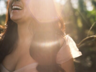 Woman smiling outside