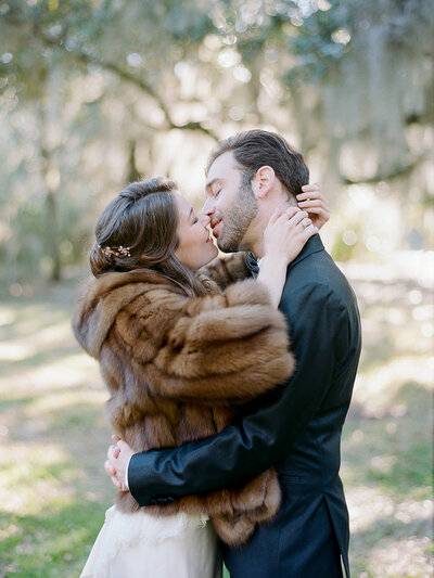 Bride and groom almost kissing for a portrait captured by New York wedding photographer, Kylee Yee