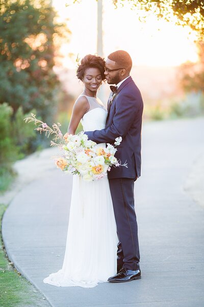 Bride and groom walk up memorial steps at their DC wedding