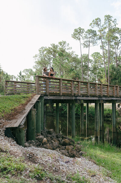 couple on bridge engagement photo