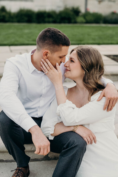 Engaged couple sharing a joyful moment outdoors, capturing love and connection | Pittsburgh Engagement Photography