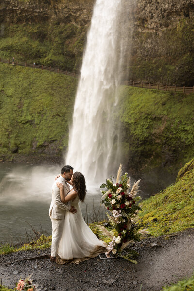 couple on rocks in a scenic area taken by montana wedding photographers