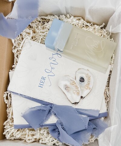 bridal gift box with vow books,  calligraphy engraved perfume and oyster shell ring dish