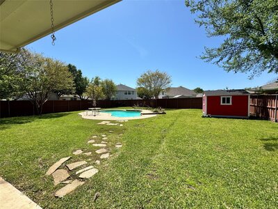 3 bedroom home with mature trees and  inground pool for sale in Terrell, Texas