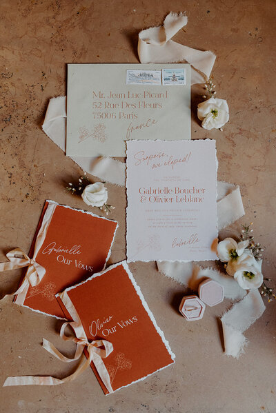 ivory and burnt orange elopement announcement and vow books for paris wedding