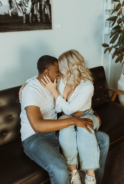 An intimate couples session between Kennedy and Cahlil announcing their pregnancy to their friends and family. They enjoyed a cozy, home-inspired session at a studio in St. Paul, Minnesota