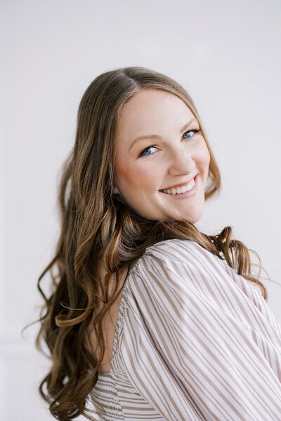 Professional headshot of wedding photographer for brand update, taken by Florida brand photographer Casie Marie
