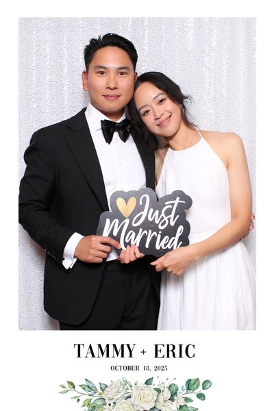 Couple pose together at wedding