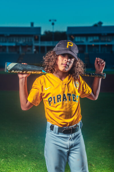 Baseball player posing with bat