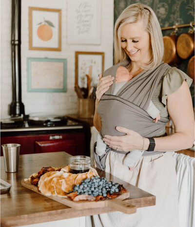 Leslie holding her little one