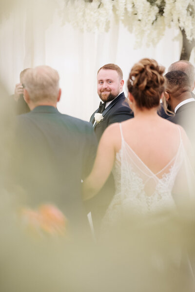 Groom sees his bride for the first time.