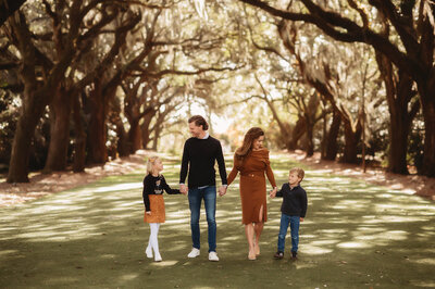 Mother embraces her teenage son during Family Photos in the Fall in Asheville, NC.