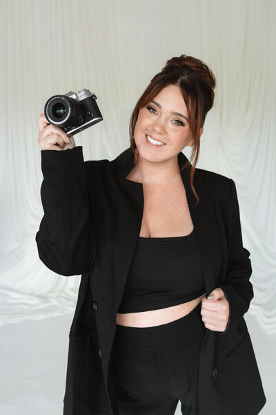 woman holding camera