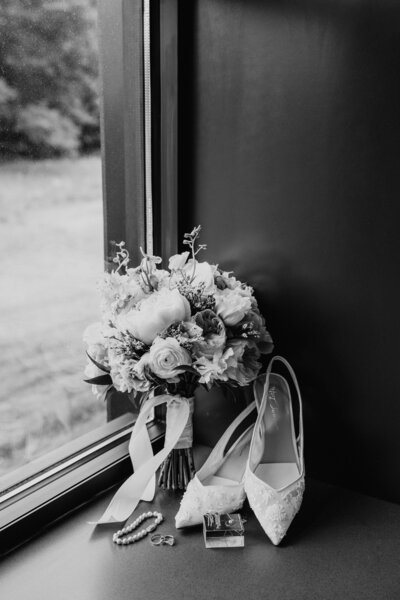 Bride holding flowers on wedding day with a Wedding Photography Minneapolis.