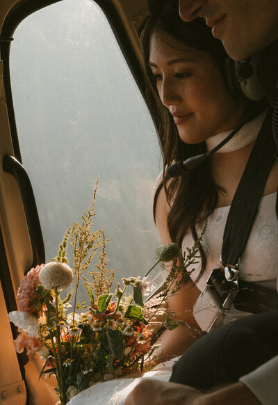 Couple outside their classic camper — candid wedding photos by Chelsea Abram Photography, Vancouver wedding photographer.