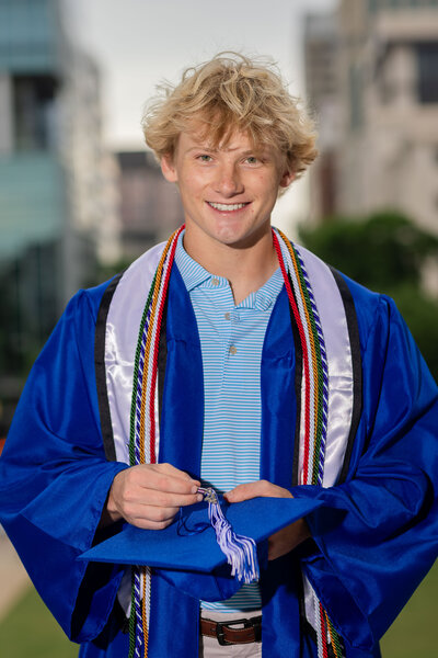 A guy taking his senior portrait in  Columbia, South Carolina