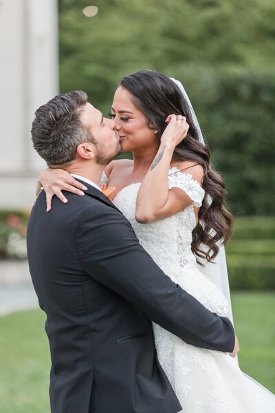 Bride and groom kissing