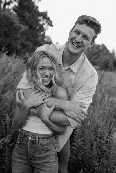 summer engagement session in an indiana flower field