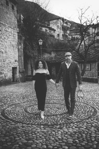San Francisco Wedding Photographers, Char and Tony in black and white image of them walking together hand in hand