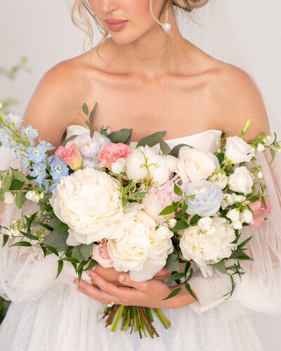 Ottawa wedding photography showing a closeup photo of a brides bouquet with white peonies