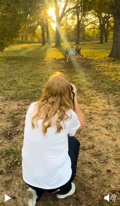 claremore newborn photographer taking pics with pretty sunlight