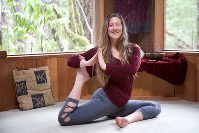 Student at Yoga Teacher Training in California  doing Mermaid Pose
