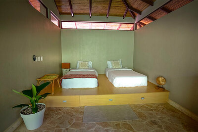 Twin bed in Jungle Bungalow 2