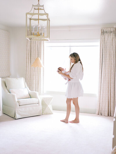 Mother and baby in elegant newborn. DFW Newborn Photographer