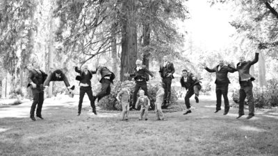 Joy of Life Events wedding planners groomsmen jumping in air at Empire Mine State Park Weddings, Grass Valley Wedding Fair