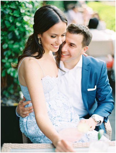 Engagement Photos at Georgetown Hotel in Washington DC. Bride in blue lace dress and groom in classic blue suite © Bonnie Sen Photography