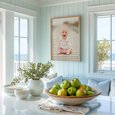 Interior mock up of framed image of baby sitting on a board walk at Isle of Palms during Family Photoshoot.