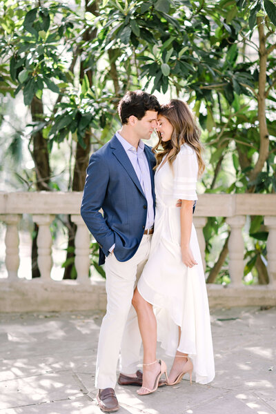 Engagement session at Laguna Gloria, with the bride in a white dress
