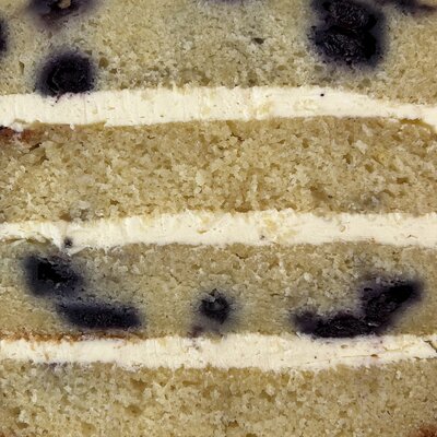 Close up of the cake and filling in our blueberry lemon cake