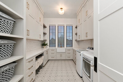 luxury laundry room design by Idaho Luxury Custom Home builder Thompson Homes