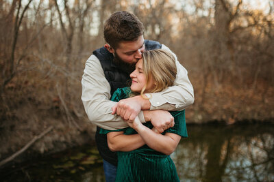 city engagement, young couple, liberty memorial, field photoshoot, kansas city engagement, kansas city couple