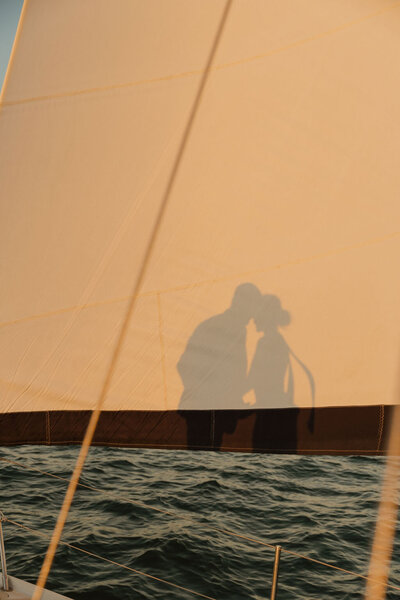 shadow of couple embracing on sailboat in arizona