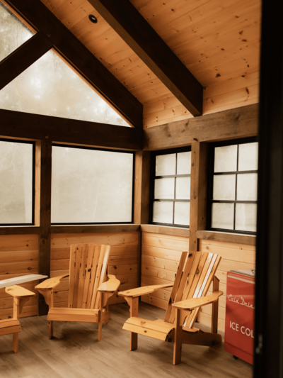 Premium custom-built timber home nestled in the woods of Haliburton Highlands, designed for elegant rustic living.