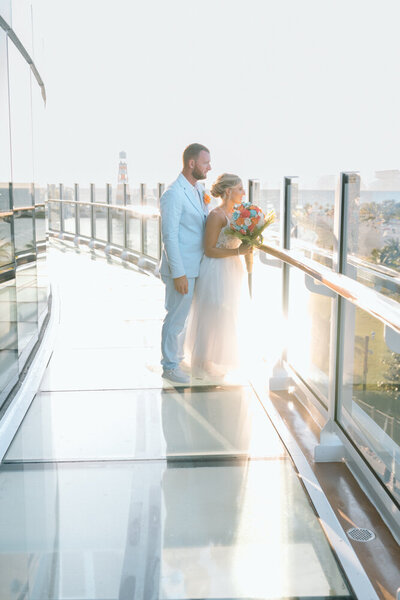 a bride and groom at their cruise wedding on the ship with a cruise ship wedding photographer